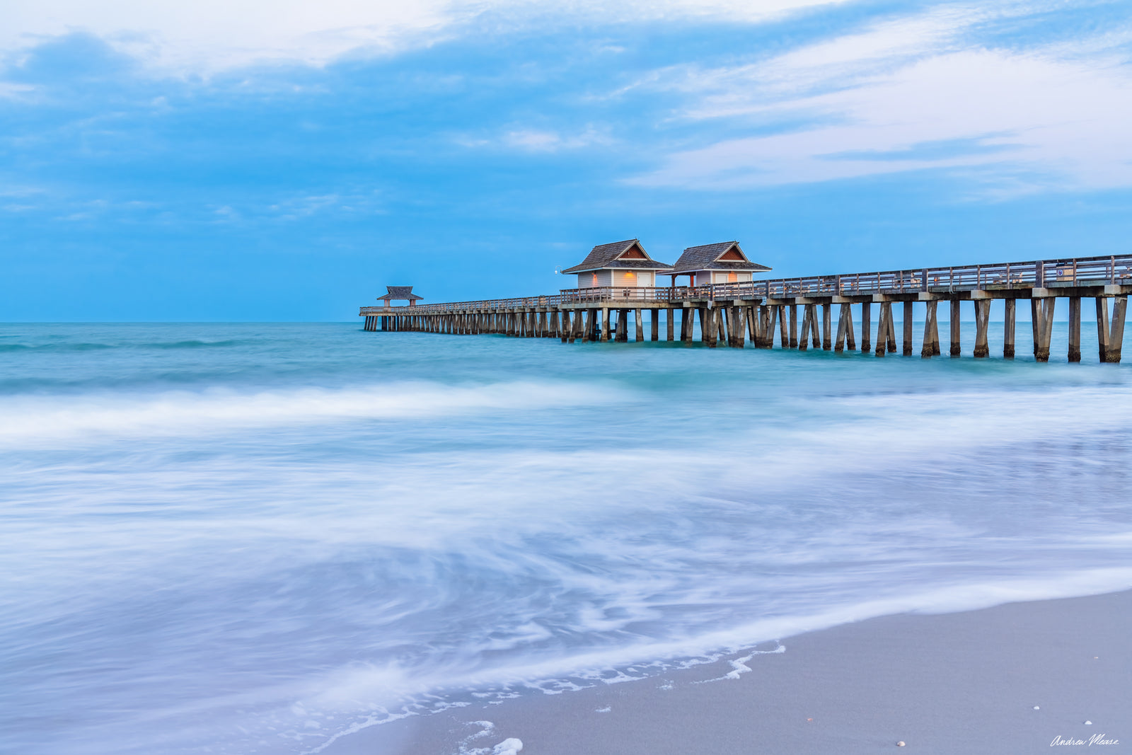 Fine art print long exposure of the naples pier during blue hour in 2019 – landscape photography by Andrew Mease